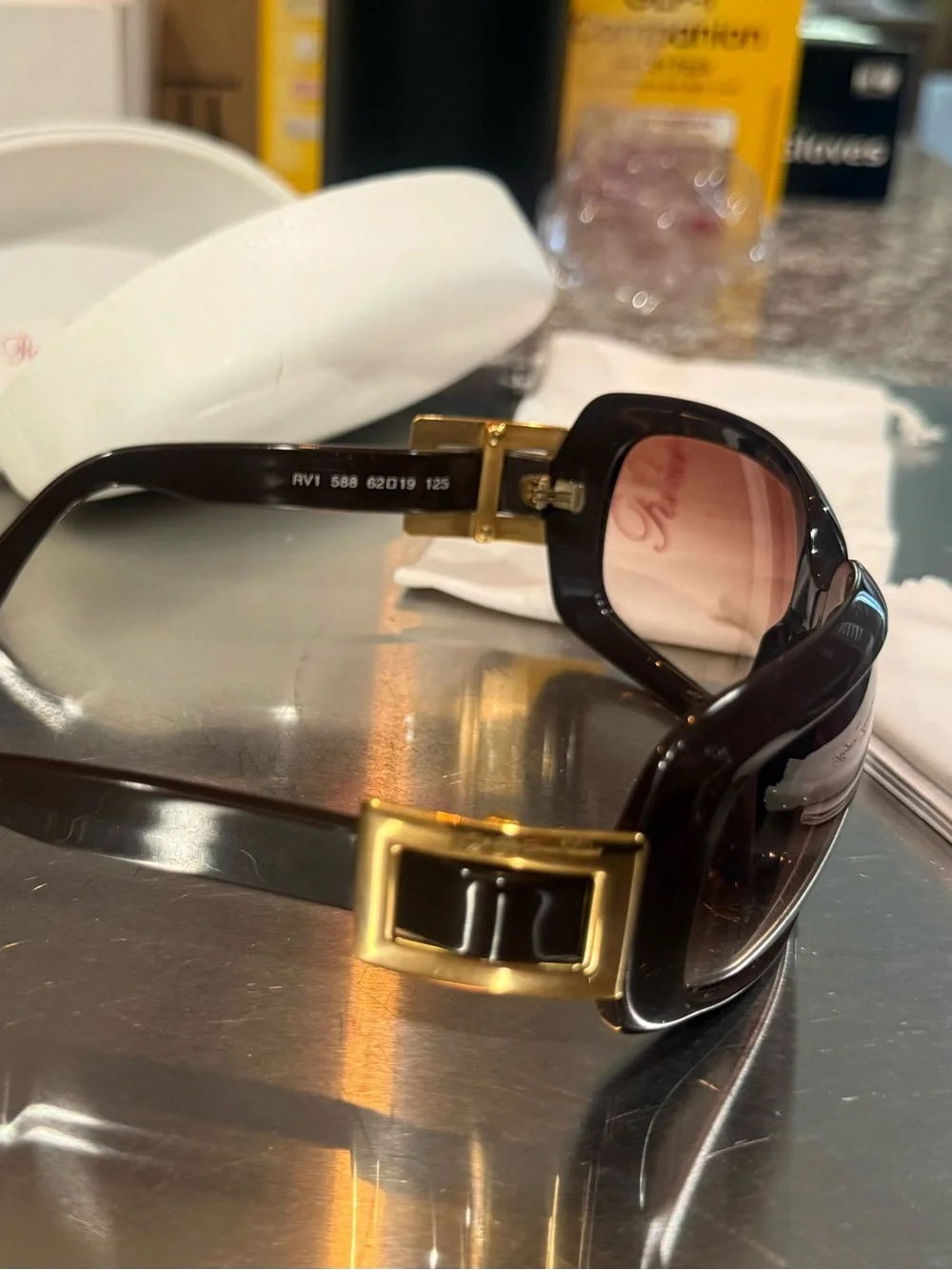 Elegant Black and Gold Women's Sunglasses - Designer Style